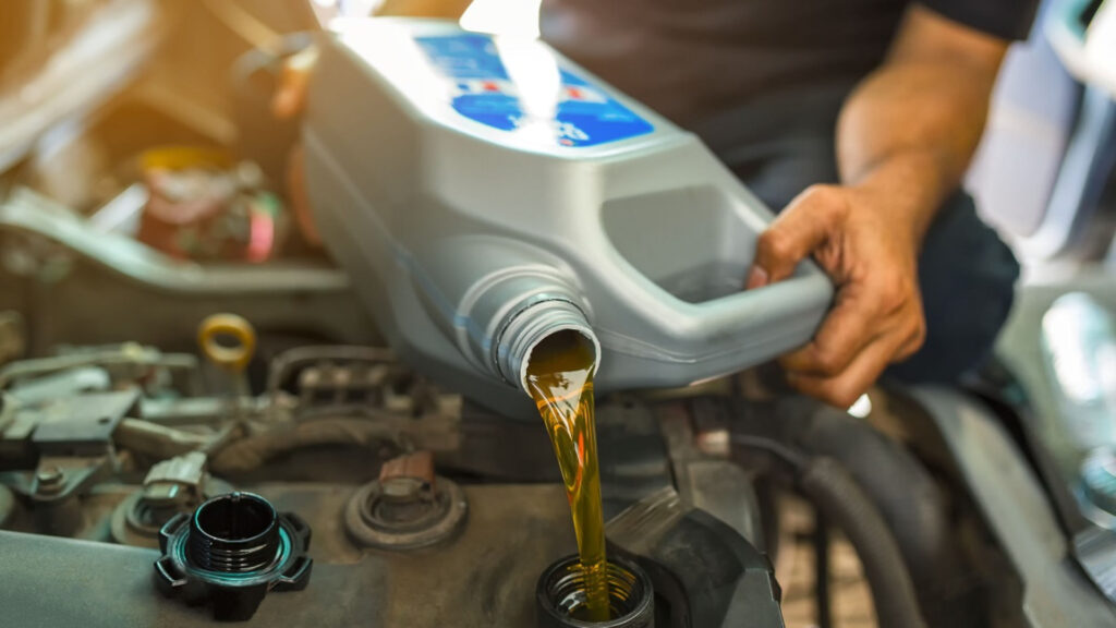 man performing Oil Change